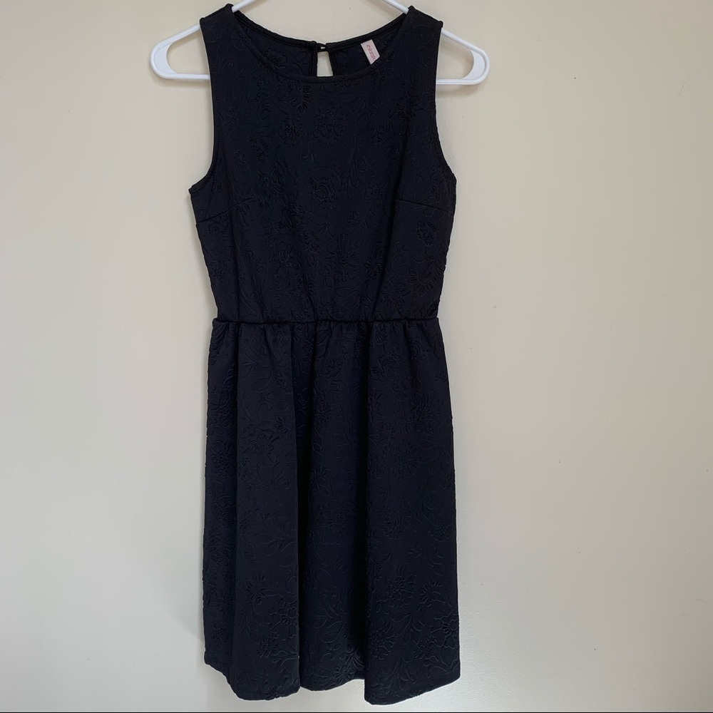 Black dress with quilted detail